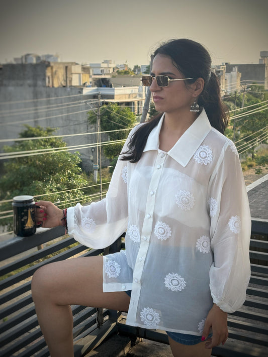 Rooh off-white Chikankari oversized shirt — lifestyle standing view, styled with shorts, everyday wear