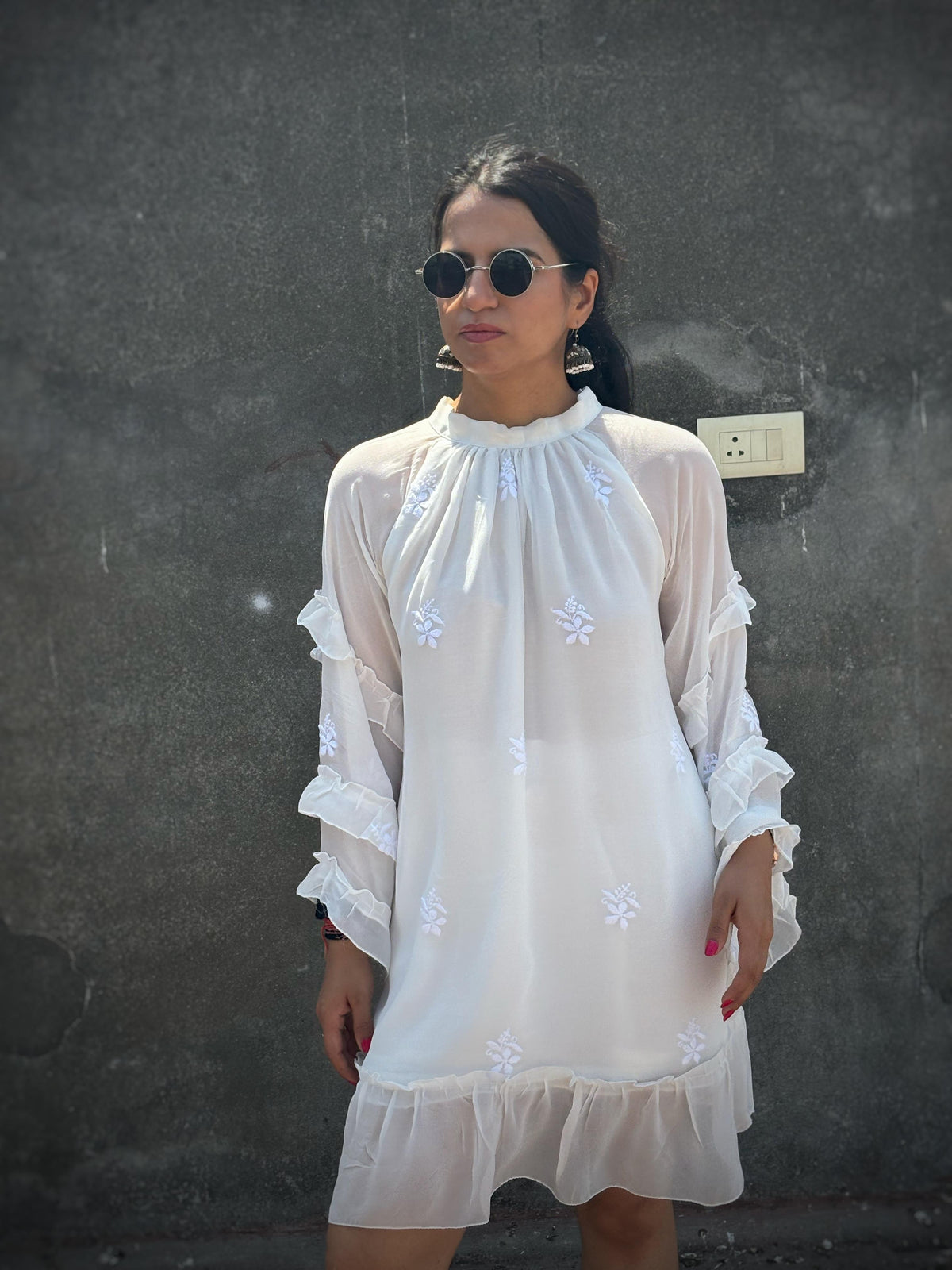 Adaa off-white Chikankari ruffle mini dress — front view, three-tier ruffle sleeves