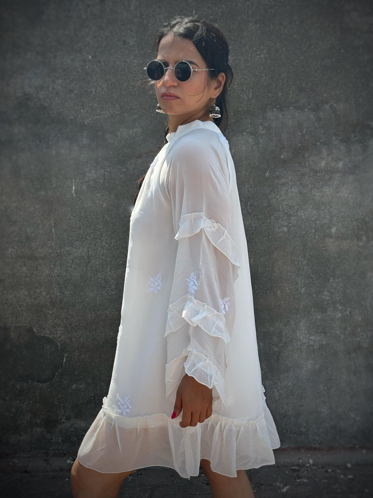 Adaa off-white Chikankari ruffle mini dress — left side view, ruffle hem
