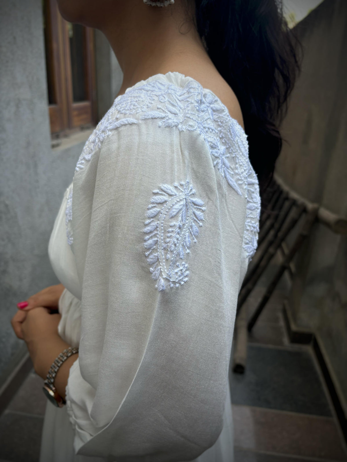 Rahat — Lucknow hand-embroidered Chikankari kairi booti on shoulder, close up