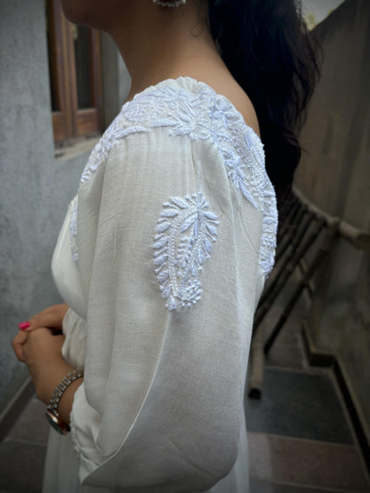 Rahat — Lucknow hand-embroidered Chikankari kairi booti on shoulder, close up