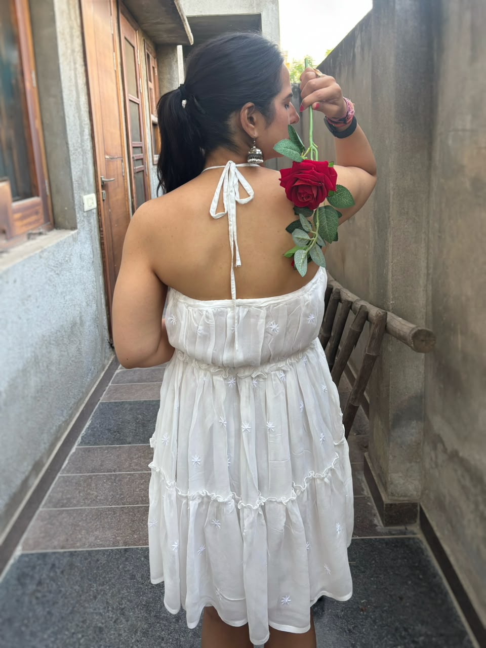 Shiddat off-white Chikankari halter neck mini dress — back view, fully open back, neck tie