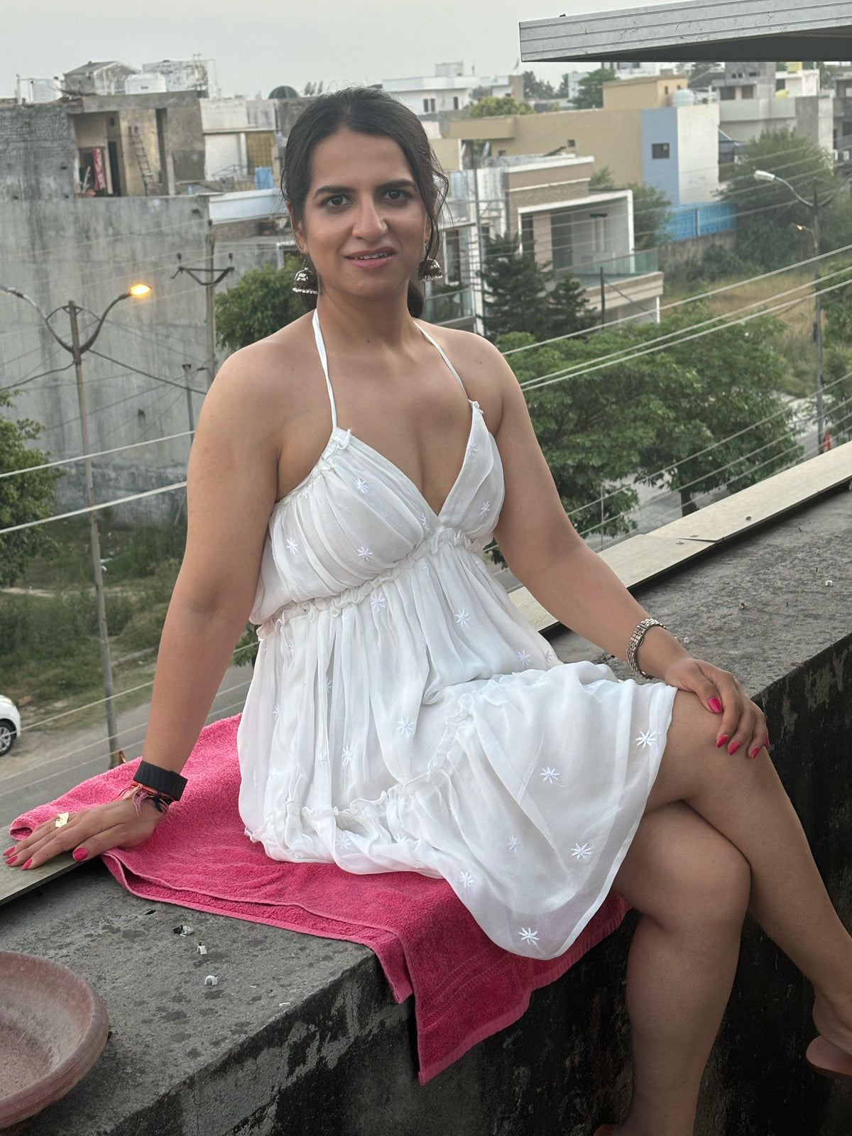 Shiddat off-white Chikankari mini dress — lifestyle - sitting on fence, evening and occasion wear
